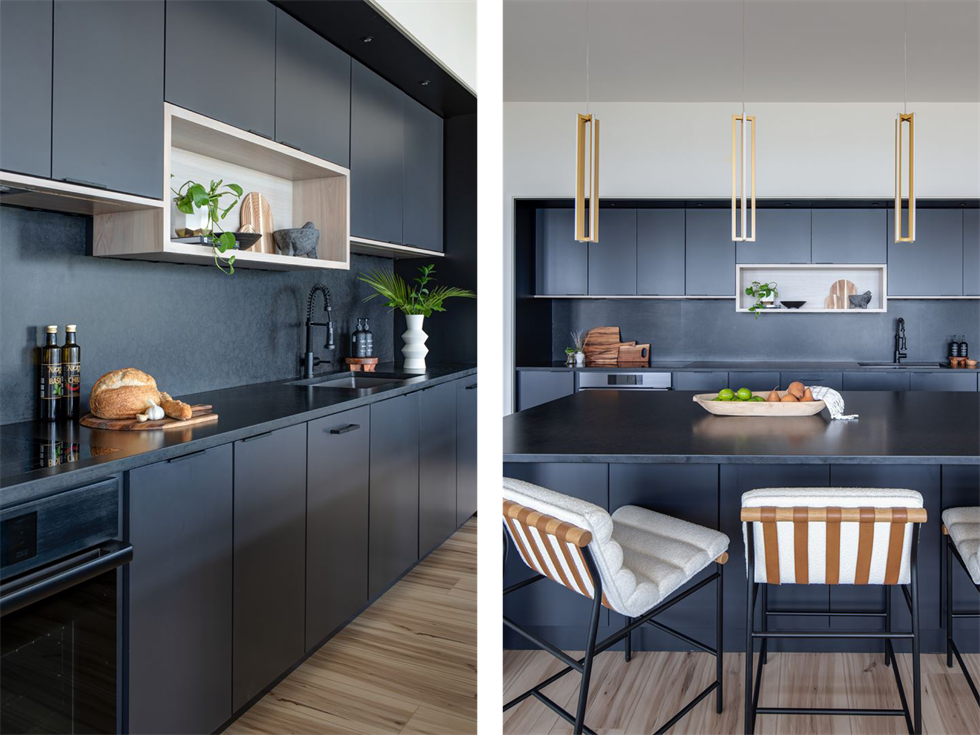 Black minimalist kitchen with light wood flooring